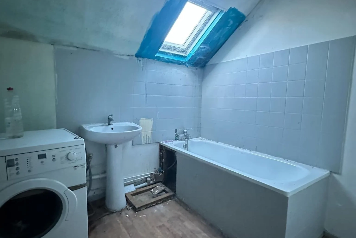 Maison de ville à Guise de 85 m² avec potentiel de rénovation 