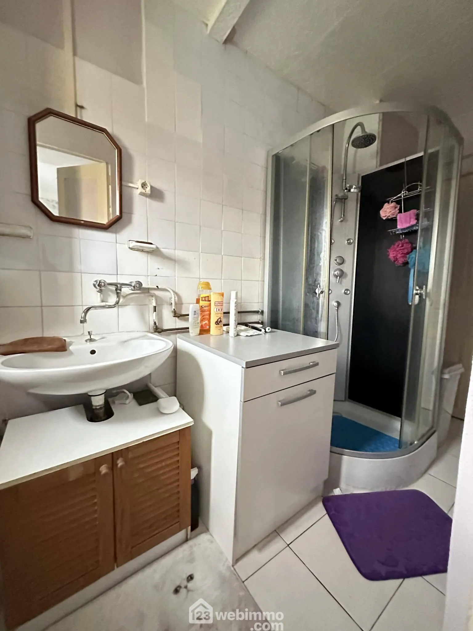 Ensemble immobilier à Crépy de 218 m² avec deux maisons et appartement loué 