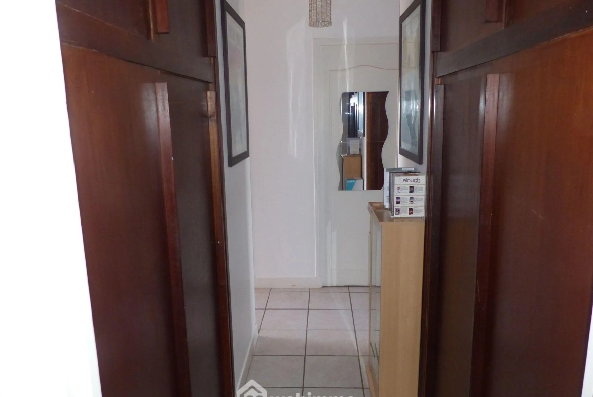 Appartement de 99 m² à Bihorel avec 3 chambres, résidence sécurisée et parking 