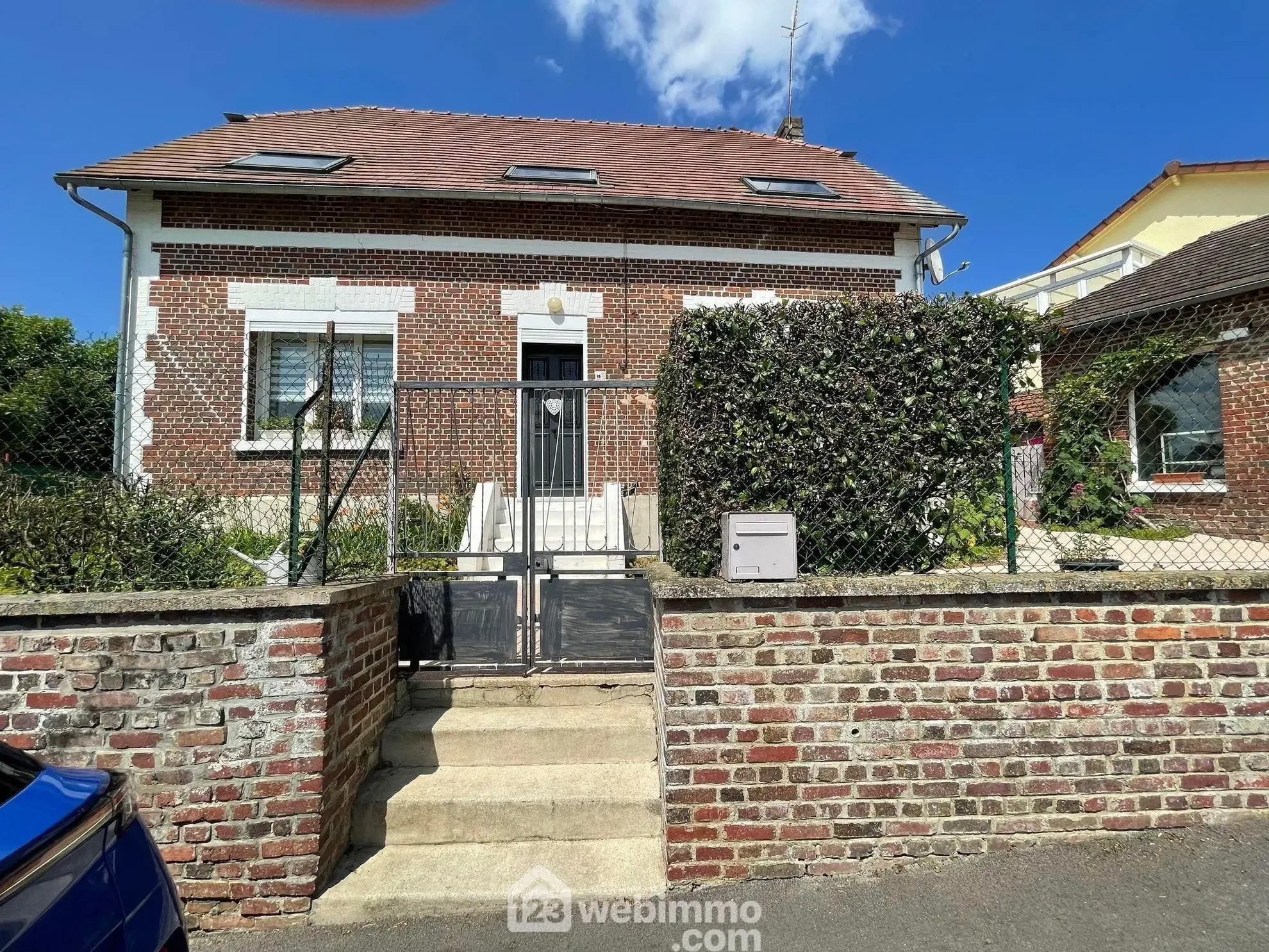 Maison lumineuse en briques de 160 m² à Anizy-le-Grand avec jardin et garage 