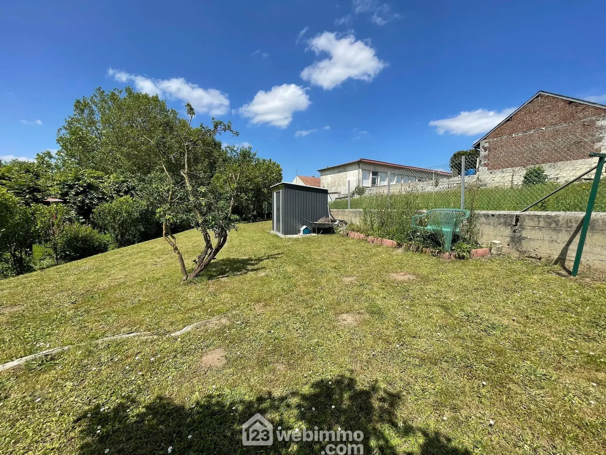 Maison lumineuse en briques de 160 m² à Anizy-le-Grand avec jardin et garage 