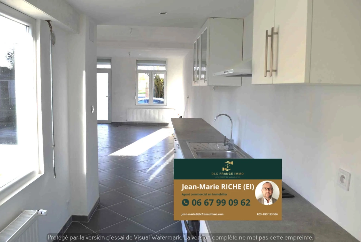 Maison semi-individuelle à vendre à Aulnoye-Aymeries - 2 chambres, garage, terrain de 542 m² 