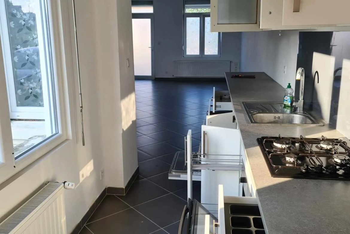Maison semi-individuelle à vendre à Aulnoye-Aymeries - 2 chambres, garage, terrain de 542 m² 