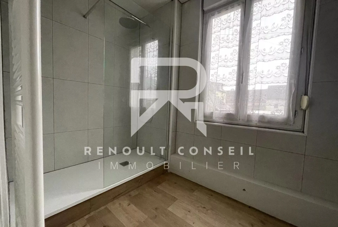 Maison 72m² à vendre au centre de Saint-Étienne-du-Rouvray avec jardin et stationnement 