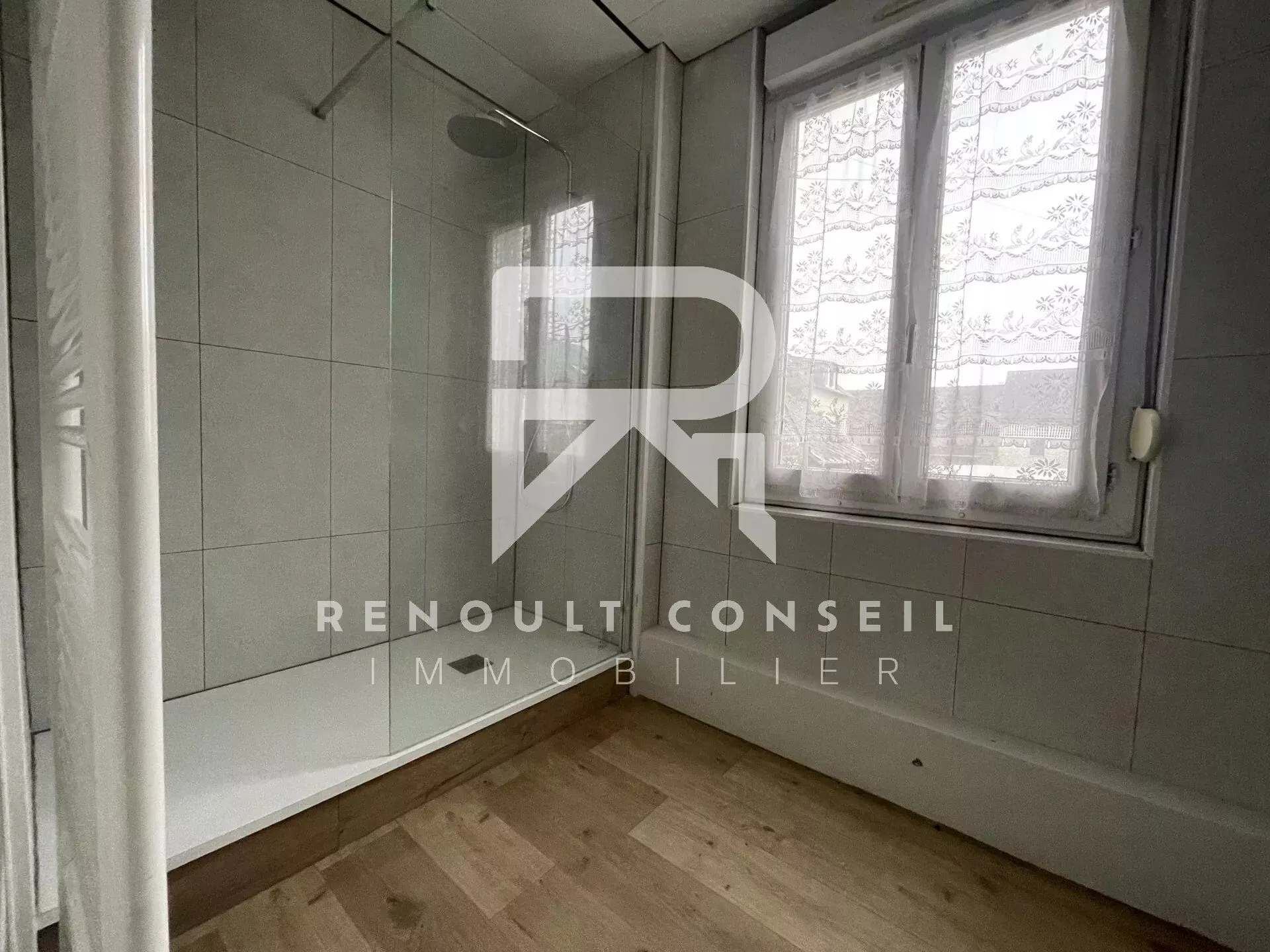 Maison 72m² à vendre au centre de Saint-Étienne-du-Rouvray avec jardin et stationnement 