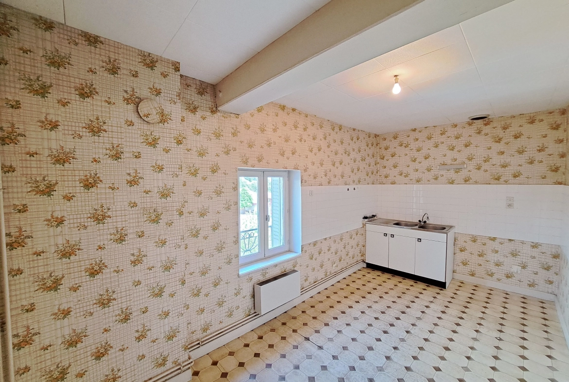 Appartement T4 à vendre à Ambert avec jardin privé et vue imprenable 