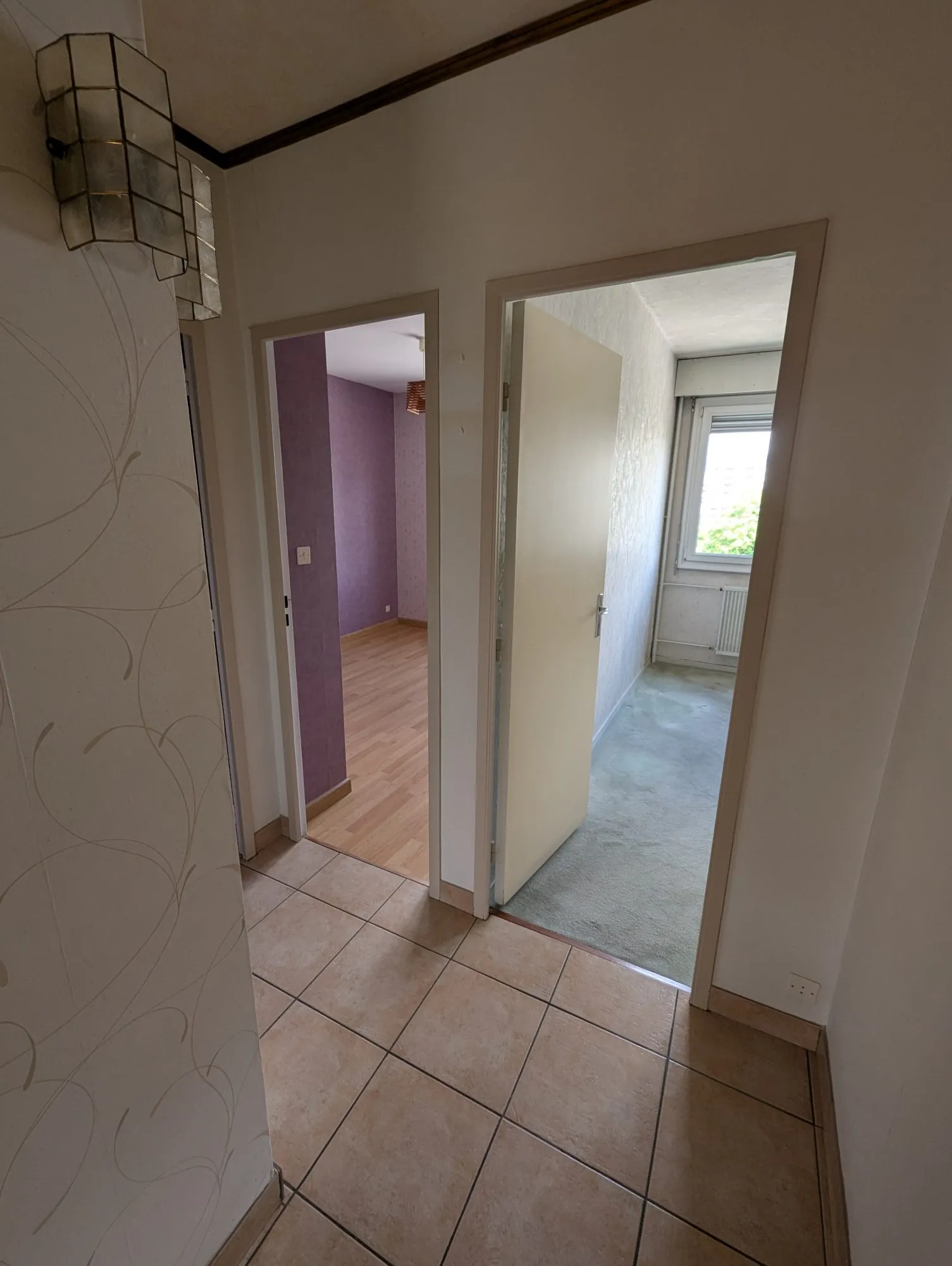 A vendre appartement traversant de 80 m² à Cognin avec balcon et garage 