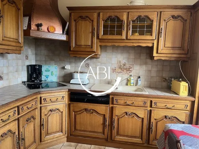 A Vendre Maison 115 m² Proche Bagnoles avec Sous-sol et Jardin 