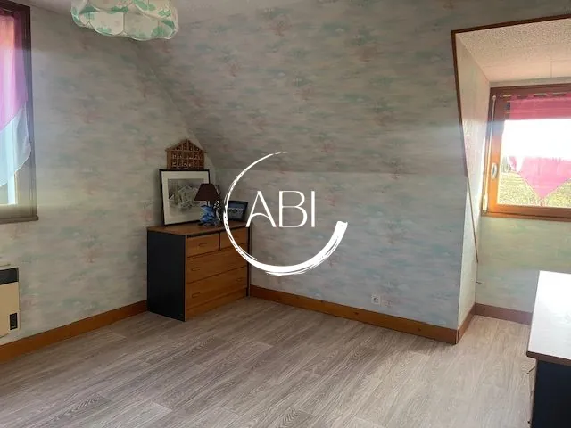 A Vendre Maison 115 m² Proche Bagnoles avec Sous-sol et Jardin 