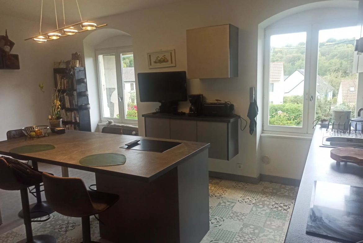 Maison à vendre à Danjoutin – 130 m², terrain de 22 ares, potentiel familial dans cadre verdoyant 