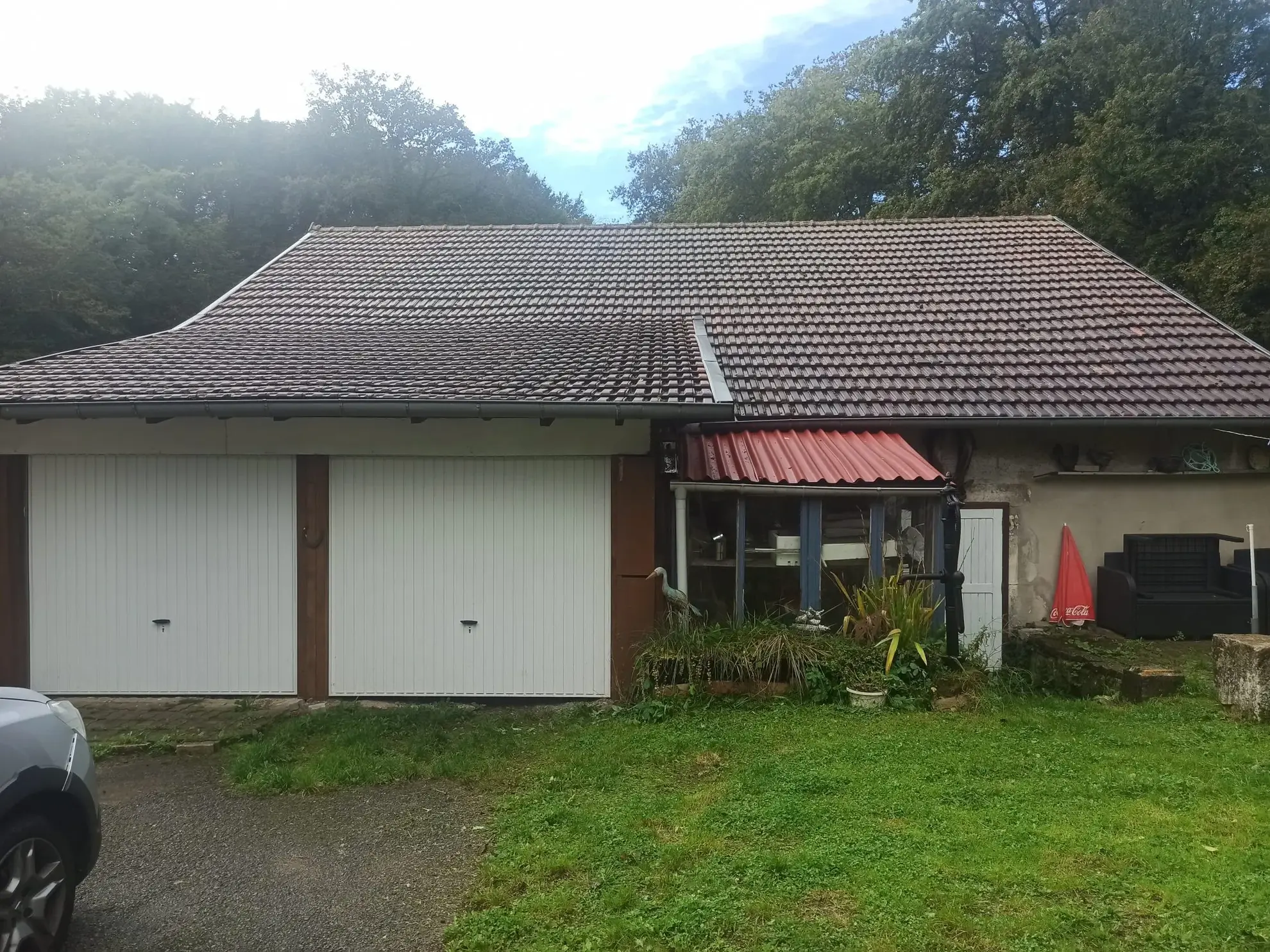 Maison à vendre à Danjoutin – 130 m², terrain de 22 ares, potentiel familial dans cadre verdoyant 