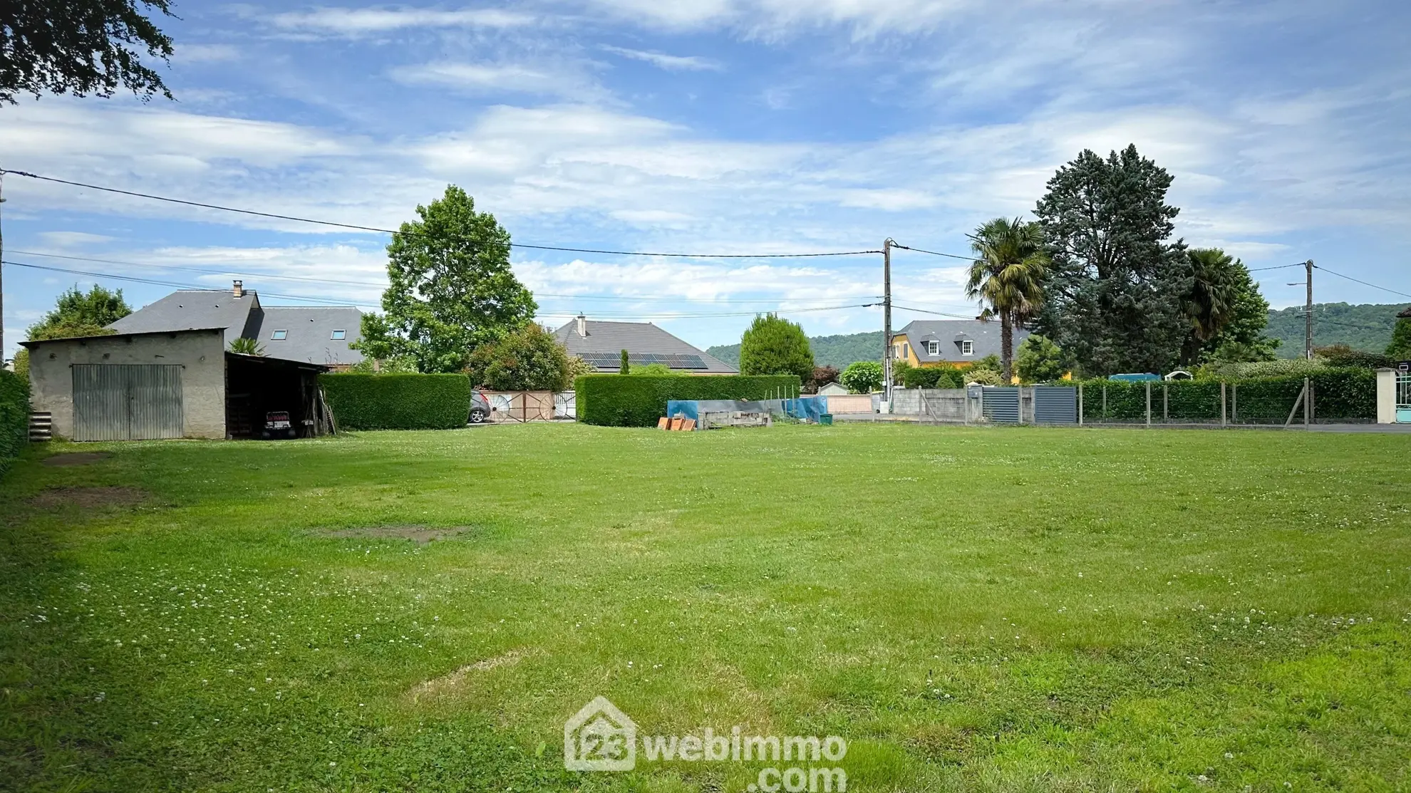Terrain constructible de 1200 m² à Bœil-Bezing - Cadre calme et verdoyant 
