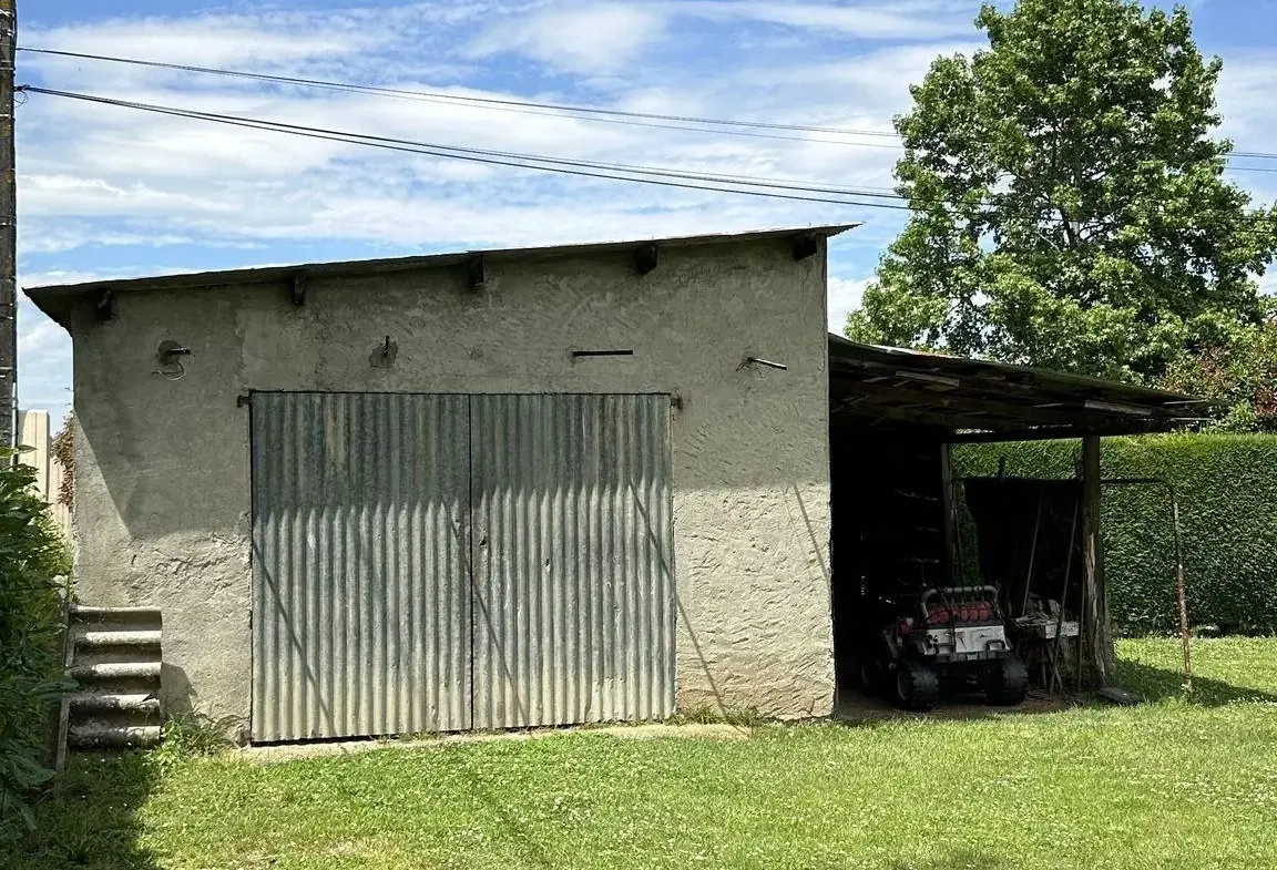 Terrain constructible de 1200 m² à Bœil-Bezing - Cadre calme et verdoyant 