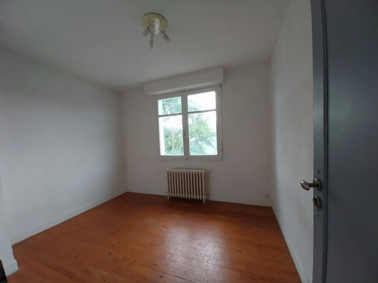 Appartement T4 à Bizanos de 62 m² avec jardin et potentiel de rénovation 