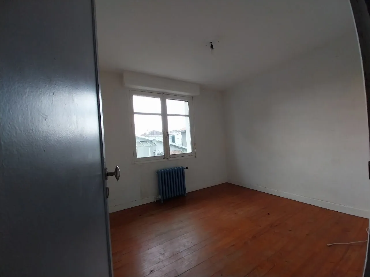 Appartement T4 à Bizanos de 62 m² avec jardin et potentiel de rénovation 