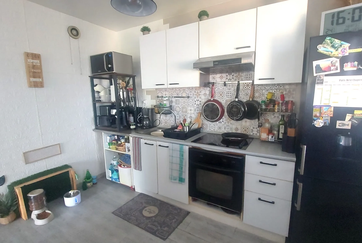 Appartement T2 de 54 m² à vendre à Andresy avec balcon et garage 