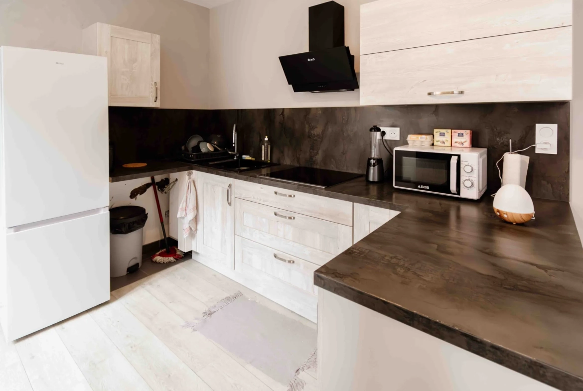 Appartement de type 2 rénové avec cave et ascenseur en centre-ville de Pontarlier 