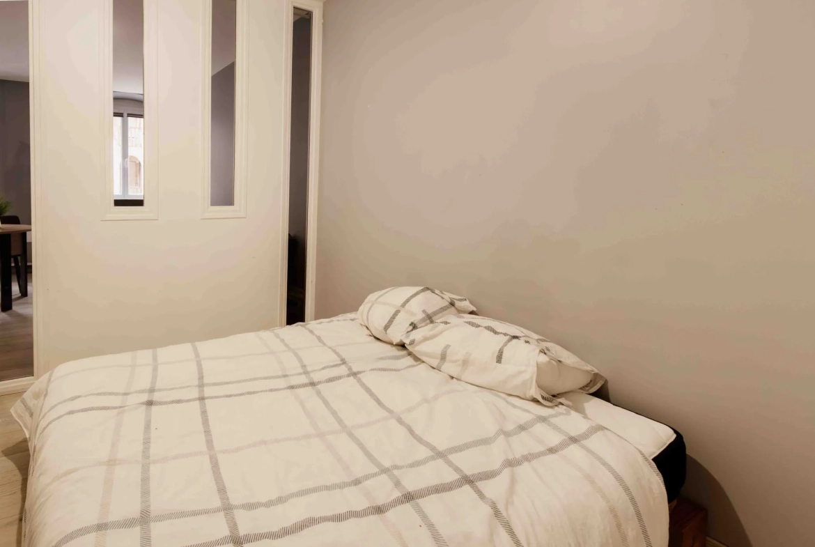 Appartement de type 2 rénové avec cave et ascenseur en centre-ville de Pontarlier 