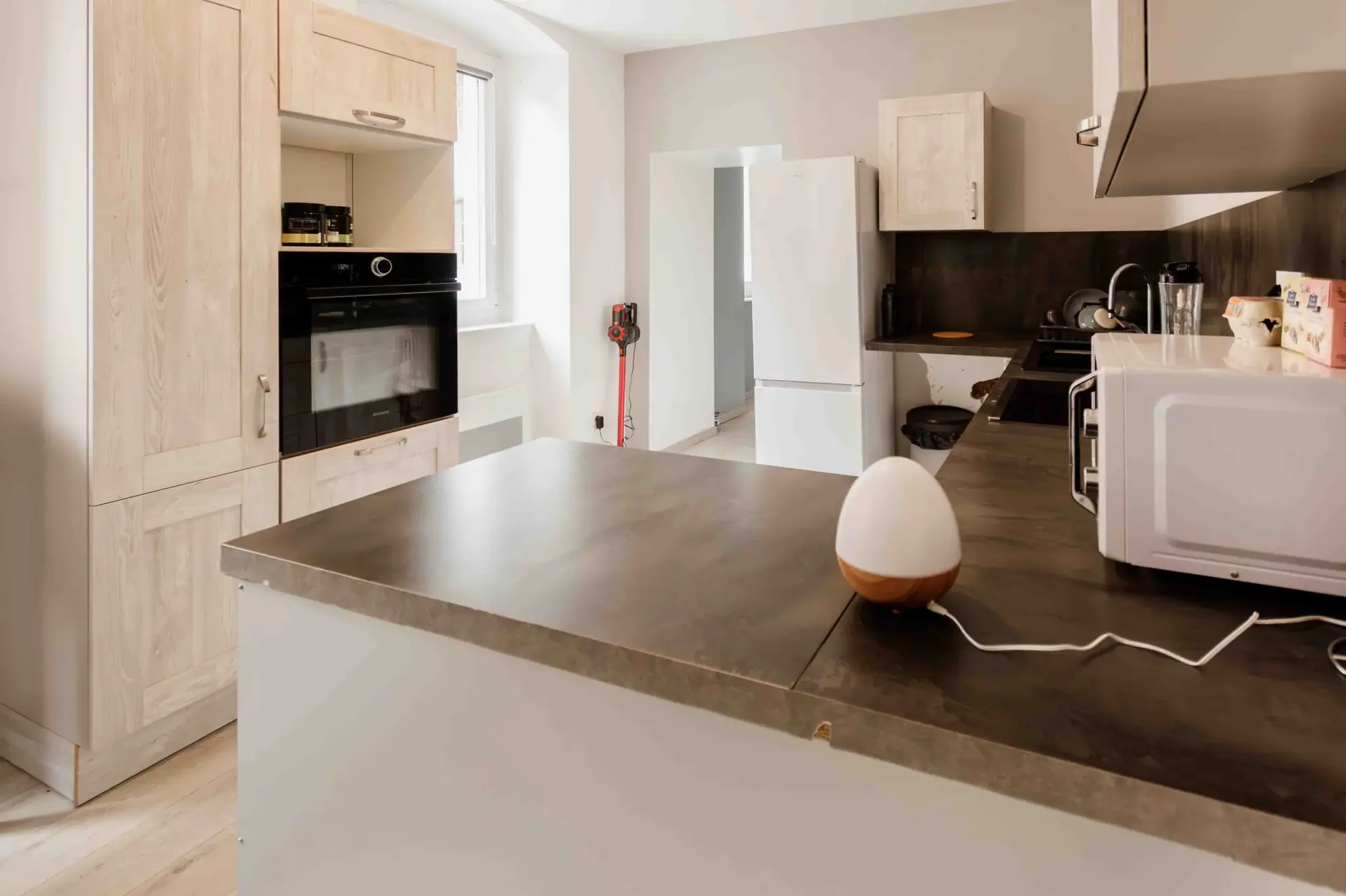 Appartement de type 2 rénové avec cave et ascenseur en centre-ville de Pontarlier 