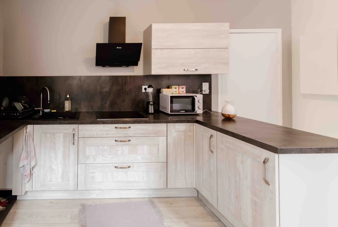 Appartement de type 2 rénové avec cave et ascenseur en centre-ville de Pontarlier 