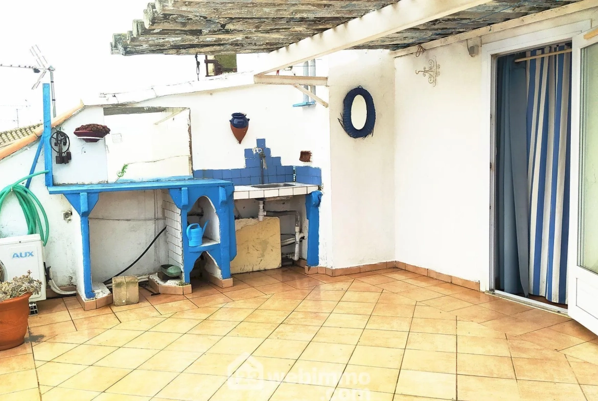 Maison de village rénovée de 80m² à Saintes-Maries-de-la-Mer avec terrasse 
