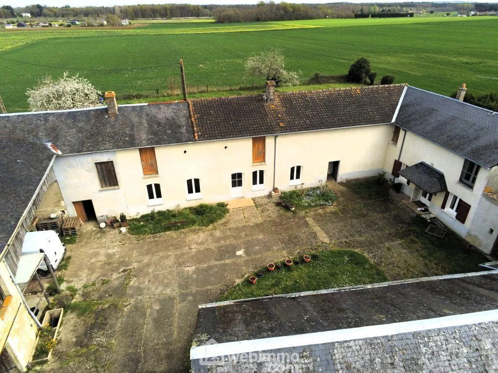 Maison de plain-pied 98 m² avec dépendances à Braye-sous-Faye 