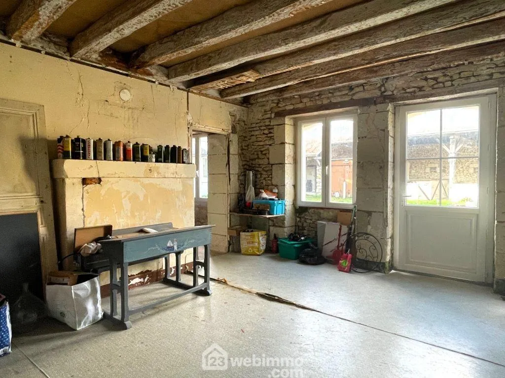 Maison de plain-pied 98 m² avec dépendances à Braye-sous-Faye 