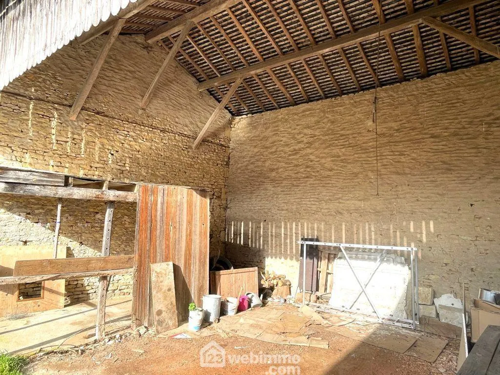 Maison de plain-pied 98 m² avec dépendances à Braye-sous-Faye 