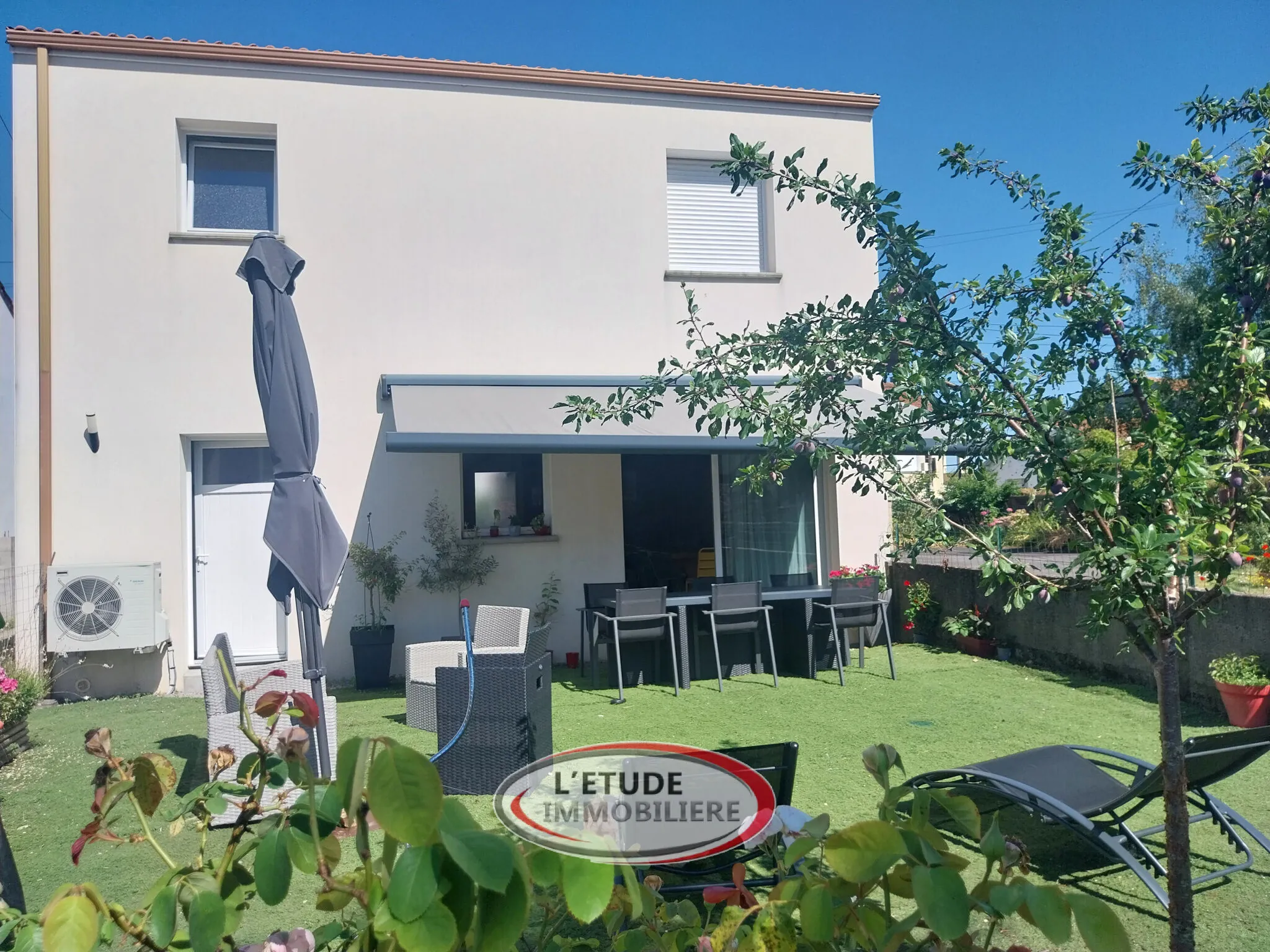 Maison moderne de 100 m² au Pellerin avec 4 chambres, jardin clos et faible consommation énergétique 