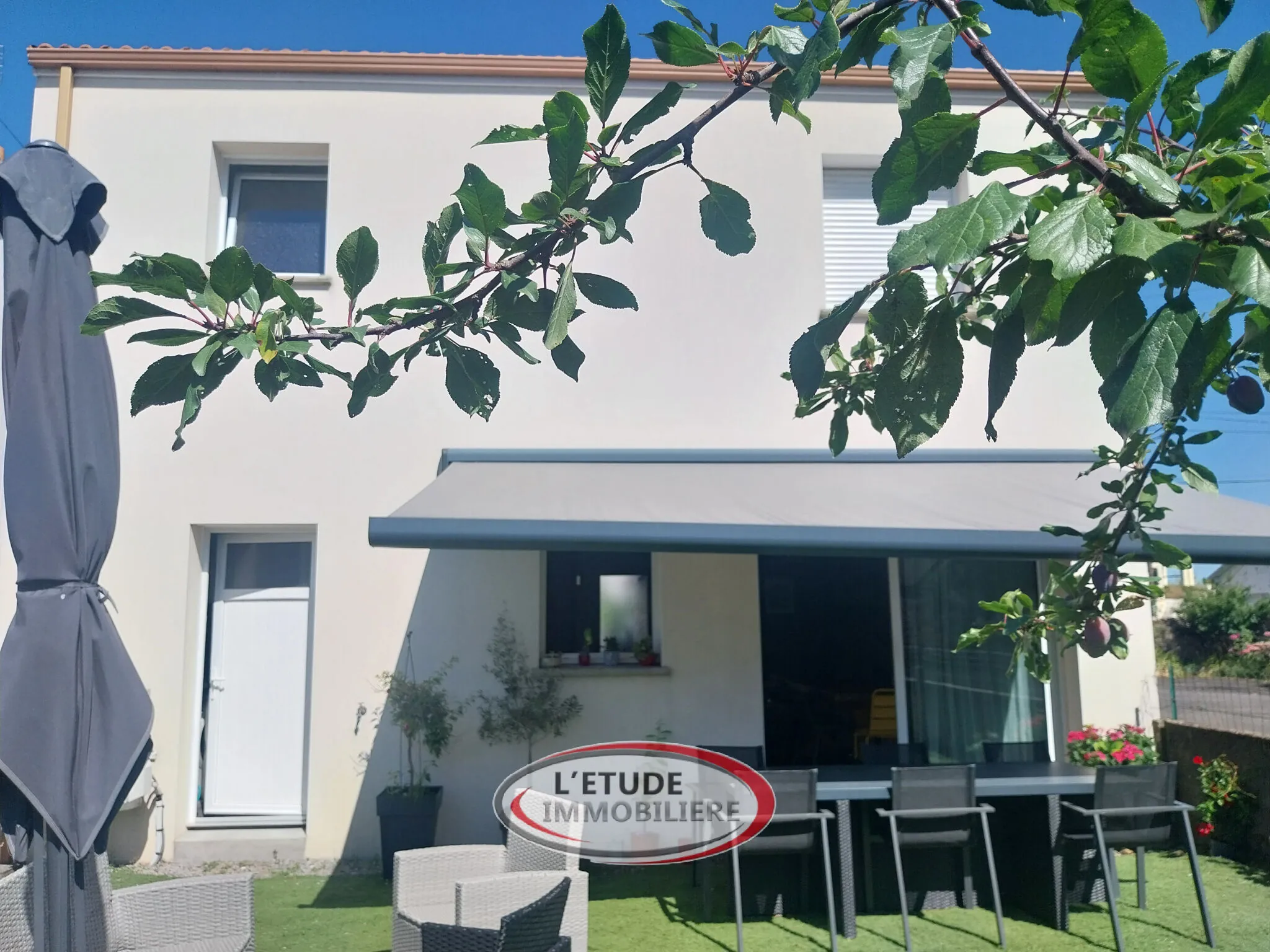 Maison moderne de 100 m² au Pellerin avec 4 chambres, jardin clos et faible consommation énergétique 