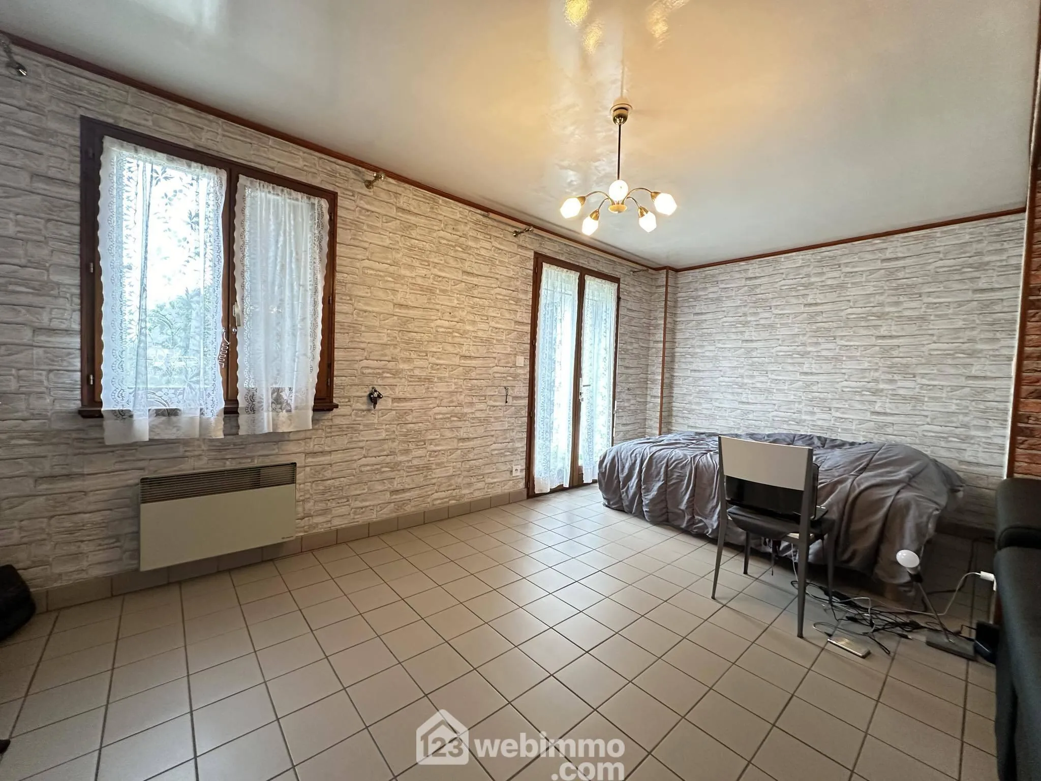 À vendre maison 127 m² à Chambry avec garage et terrain clos 