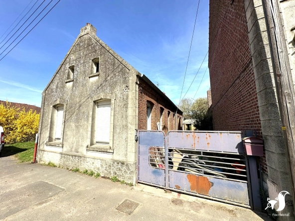 Maison à vendre à Montigny-en-Cambrésis – Projet de rénovation avec potentiel