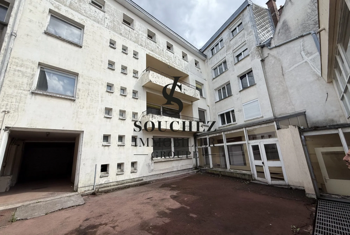 Appartement de 90 m² à aménager avec parking en hyper-centre d'Arras 