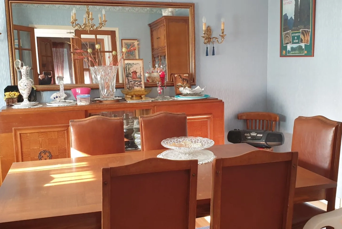 Maison spacieuse à Saint-Gaudens avec grand terrain et potentiel locatif élevé 
