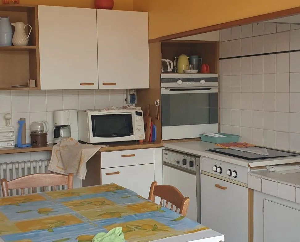 Maison spacieuse à Saint-Gaudens avec grand terrain et potentiel locatif élevé 