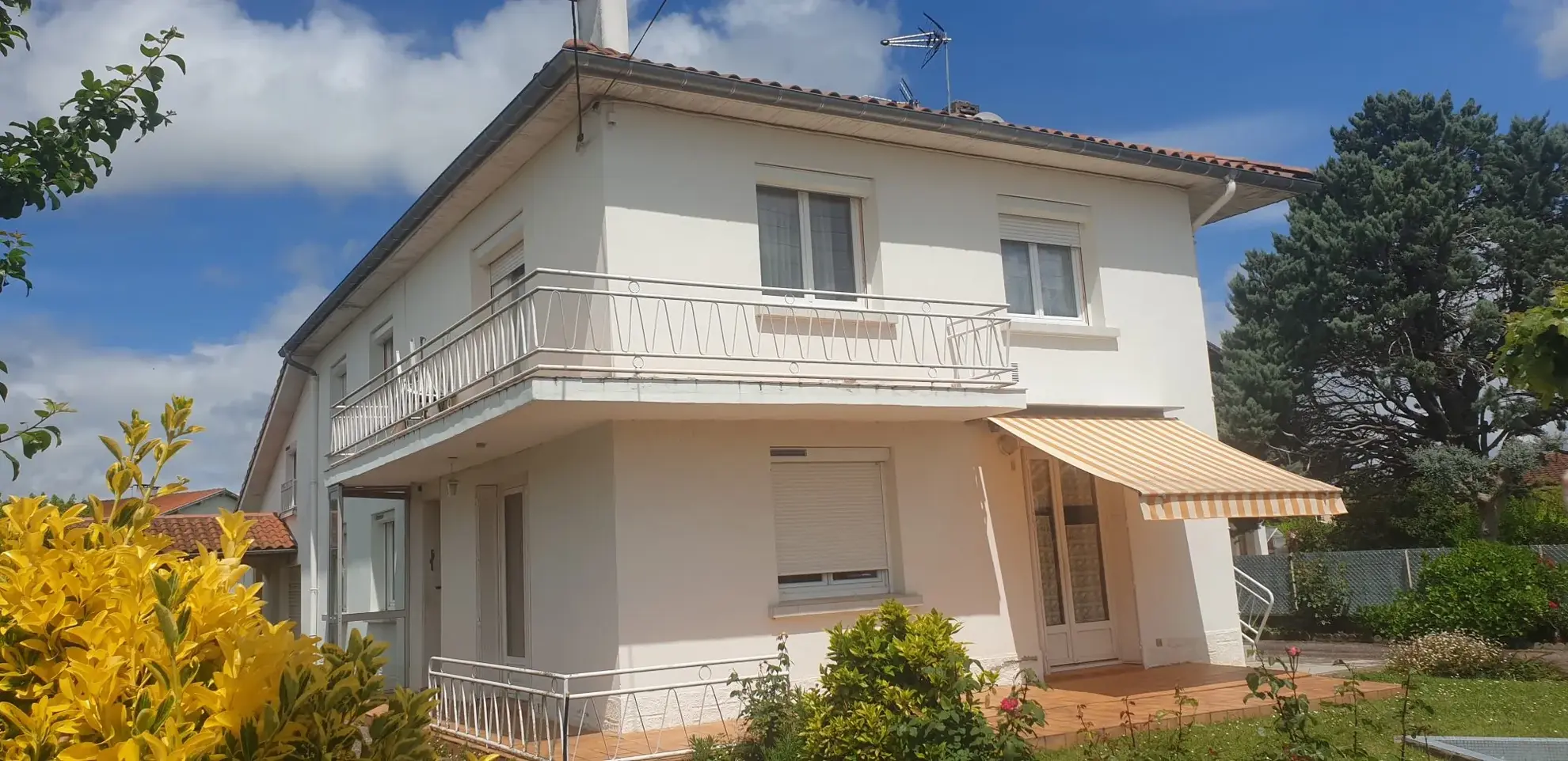 Maison spacieuse à Saint-Gaudens avec grand terrain et potentiel locatif élevé 