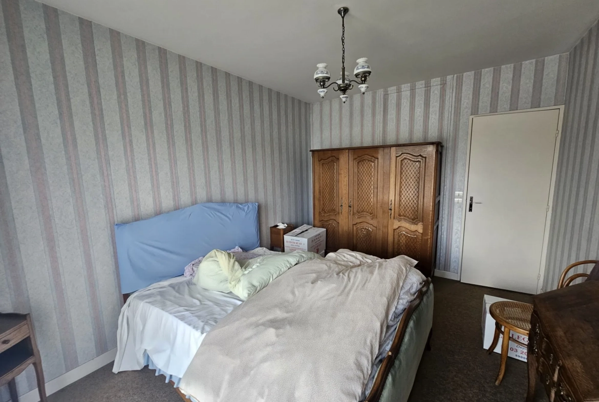 Charmant appartement T3 de 74 m² à Vendeville, balcon, cave et parking sécurisé 