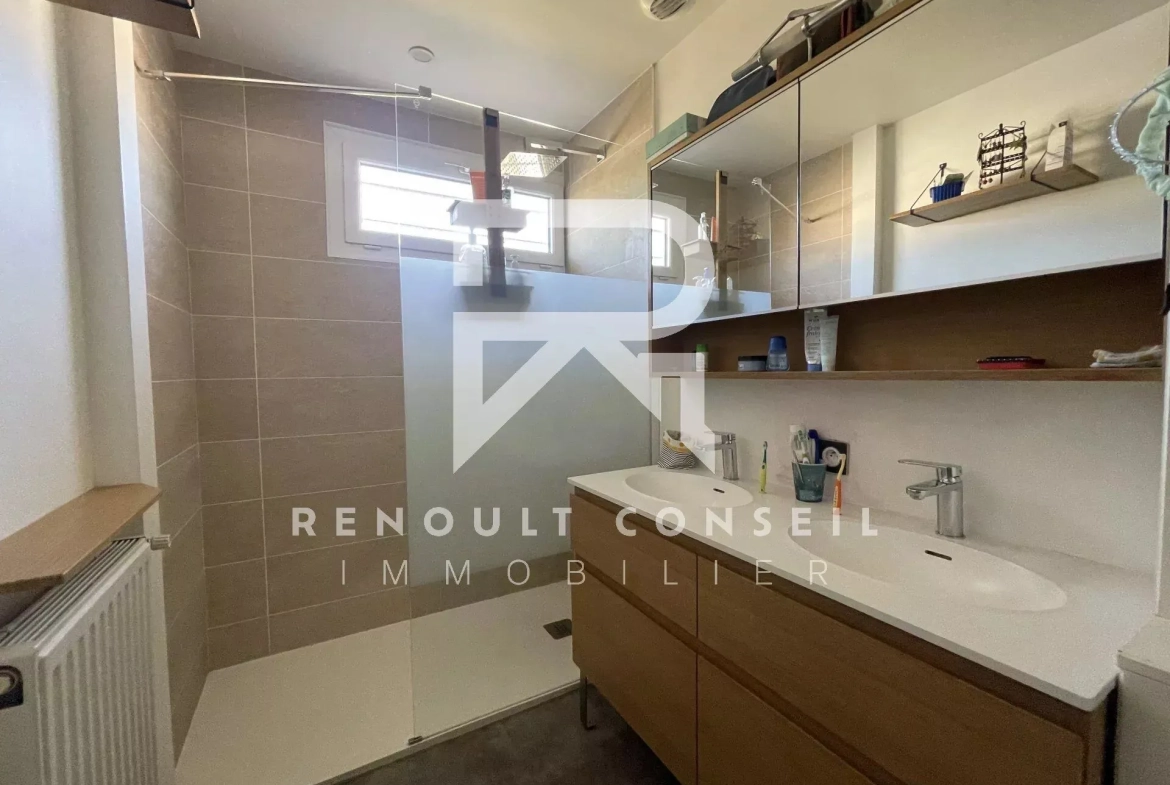Maison de 120 m² Carrez à Franqueville-Saint-Pierre avec garage et terrasse 