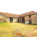 Ancienne ferme en pierre à rénover à Dompierre-les-Ormes - Potentiel Unique