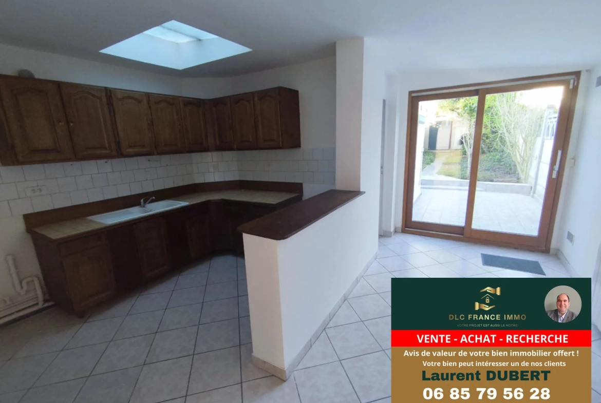 Maison de ville à Valenciennes avec jardin, 2 chambres, pièce mansardée prête à vivre 