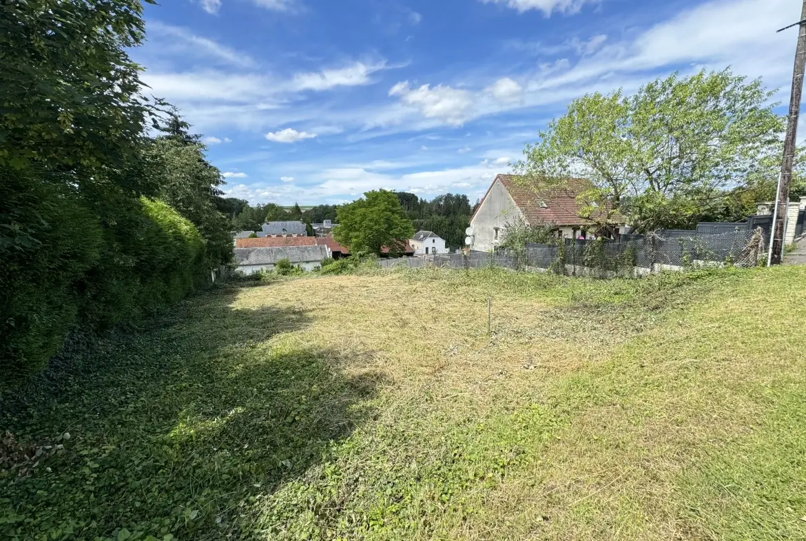 Terrain à bâtir de 831 m² à Dommartin avec vue dégagée 