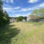 Terrain à bâtir de 831 m² à Dommartin avec vue dégagée
