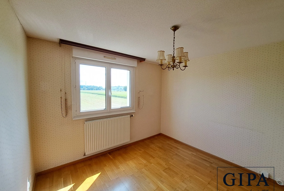 Chambre 1 Appartement 3 pièces de 65 m² avec balcon à Wolfisheim 