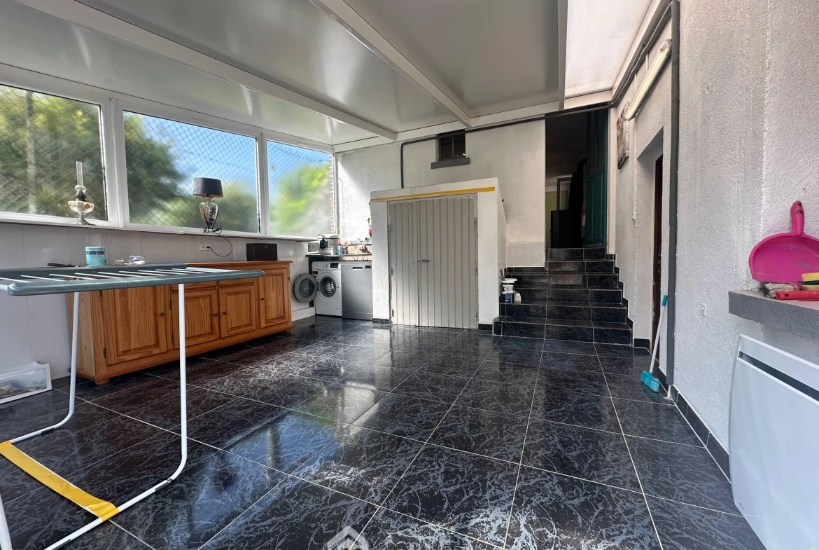 Maison spacieuse de 137 m² à Danizy avec véranda et garage 