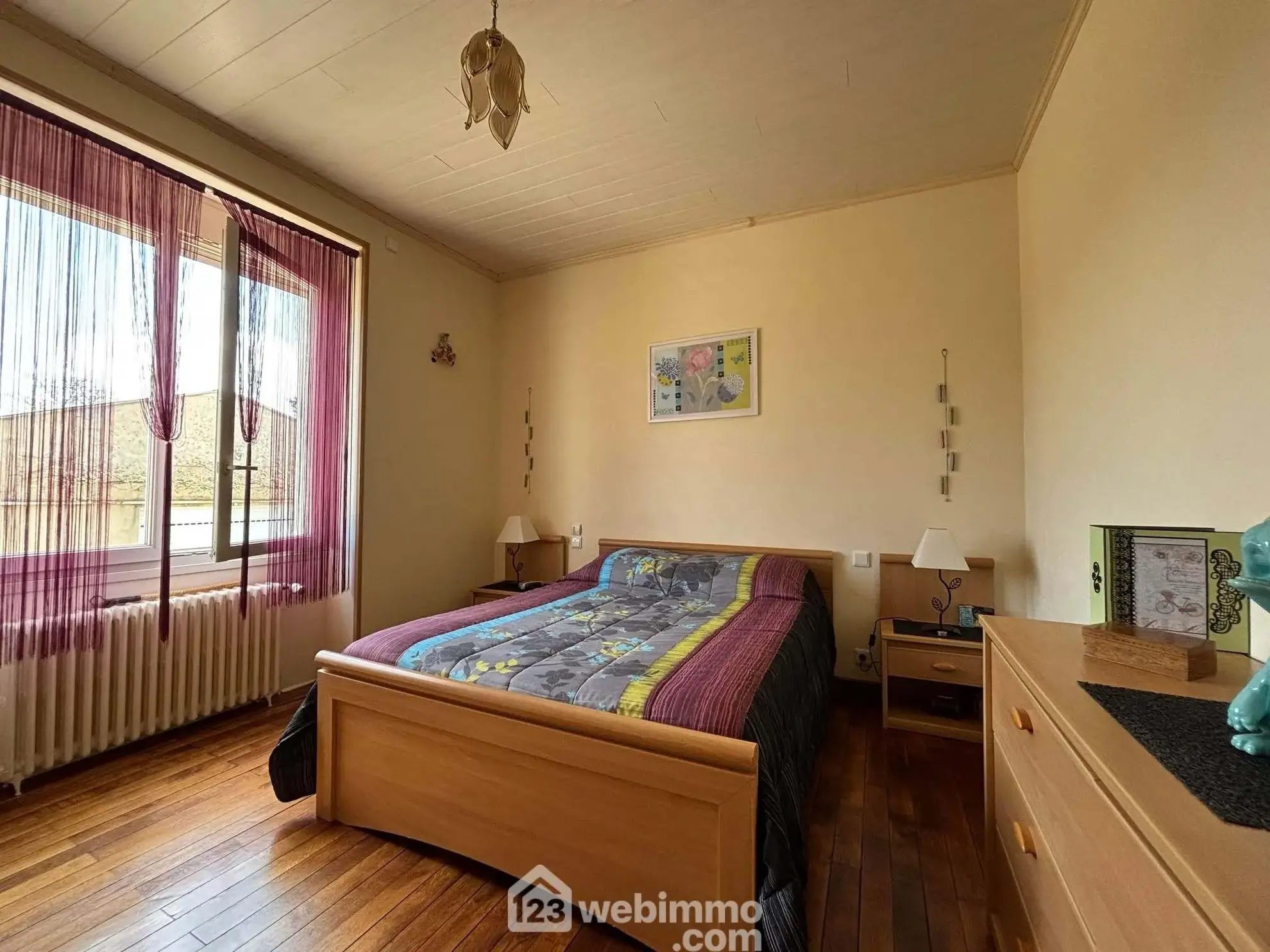 Maison 108m² à Dangé-Saint-Romain avec terrain clos et possibilités d'aménagement 