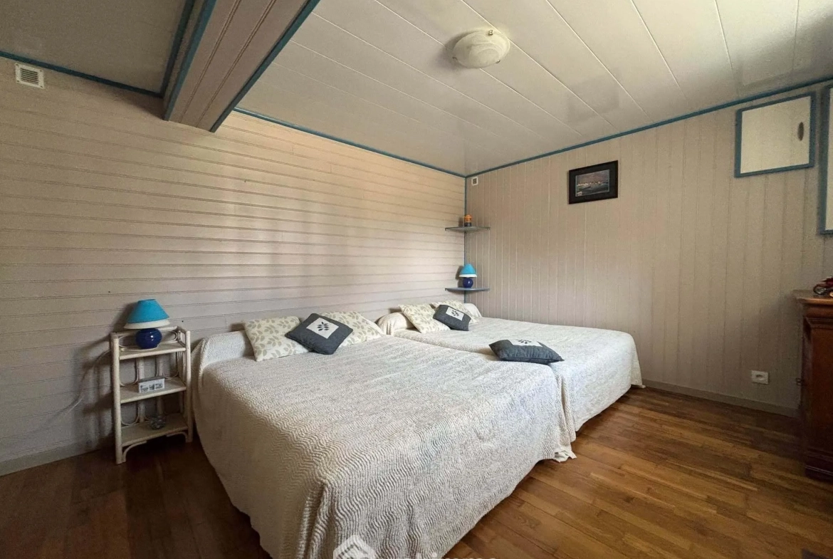 Maison 108m² à Dangé-Saint-Romain avec terrain clos et possibilités d'aménagement 