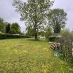 Terrain constructible de 380m² à Houdan avec vue dégagée, calme et proximité écoles et commerces