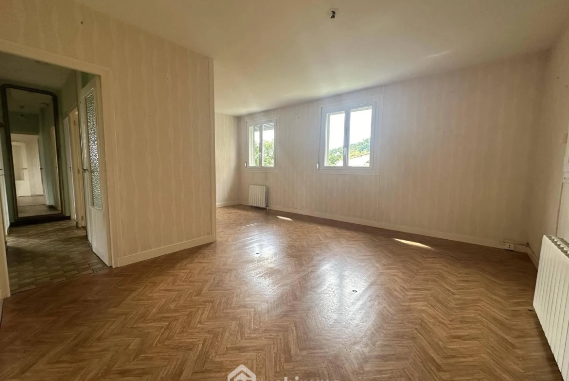 Maison de plain-pied avec sous-sol à Laon - 2 chambres, garage et atelier 