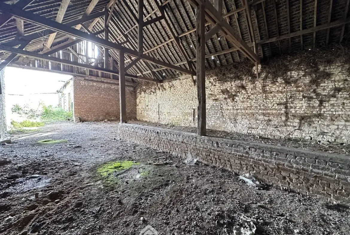 Grande grange à aménager de 160 m² à Chalandry - Potentiel de rénovation immobilier 