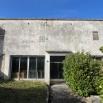 Grand local de 200 m² avec 5 garages loués à Sceaux-sur-Huisne
